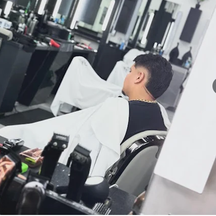 Client relaxing in barber chair